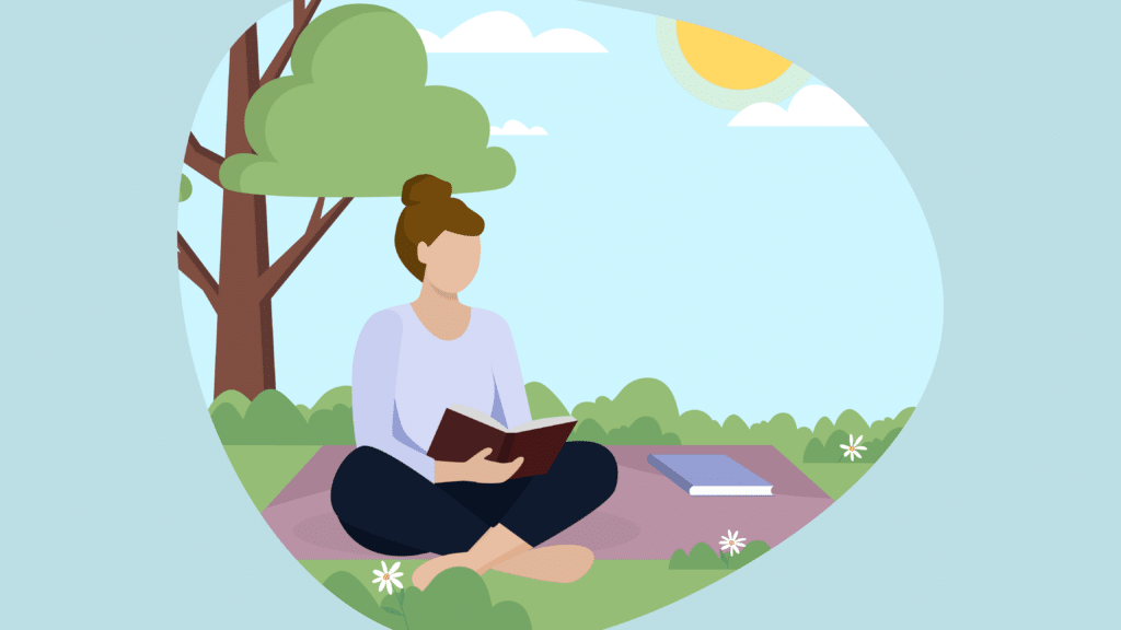 A girl reading a book in the park